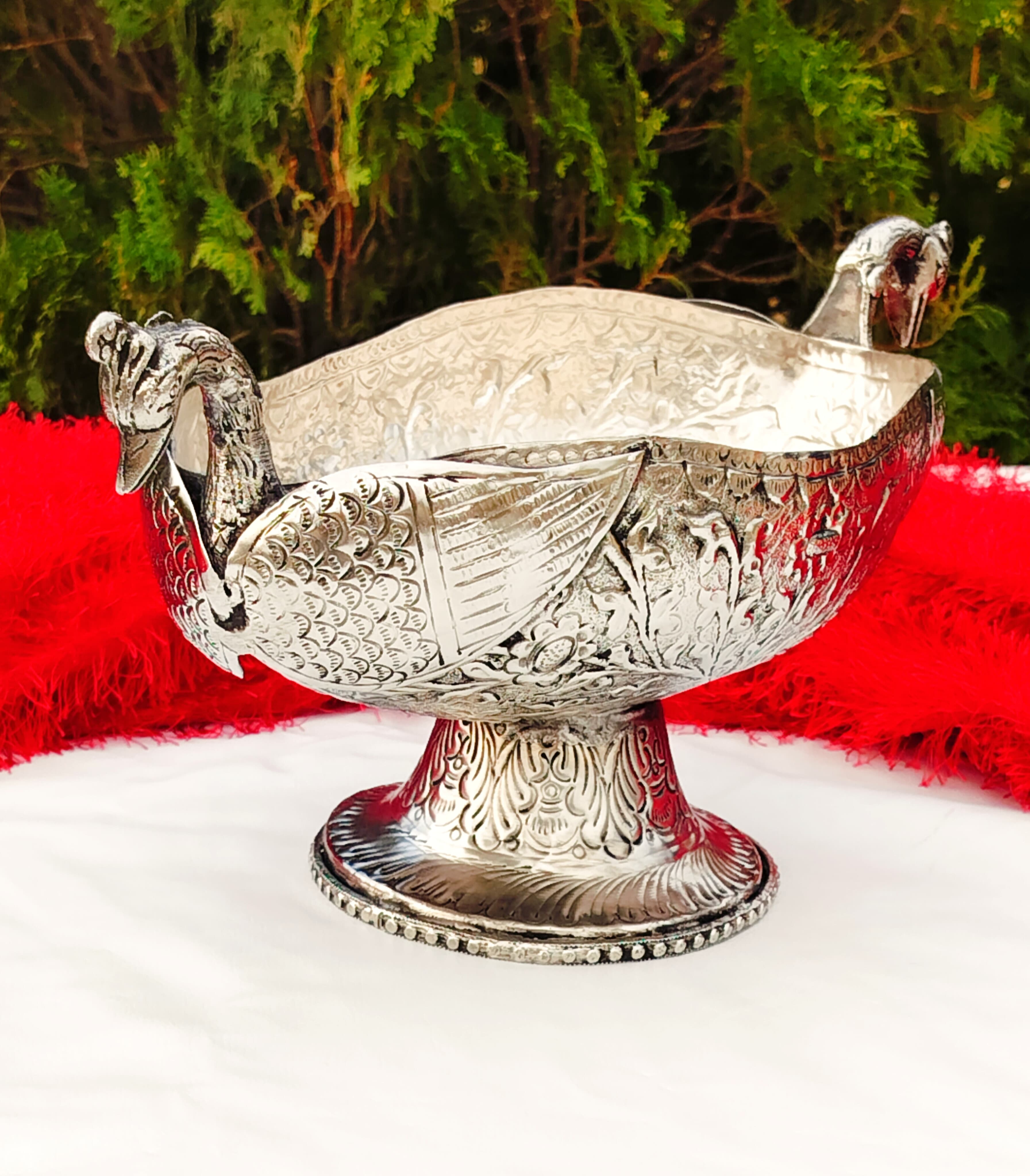 Antique finish German silver peacock urli/bowl with stand